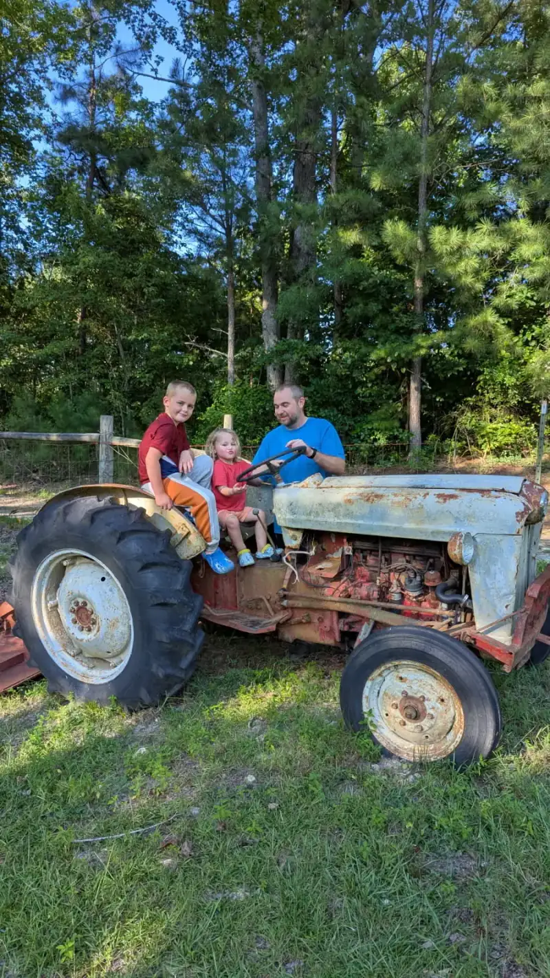 Daniel Moss with Moss and Sons tractor and equipment